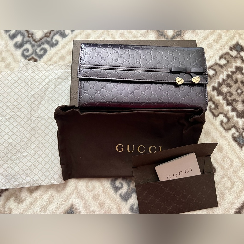 - sold Gucci micro guccisimma  purple Wallet. New